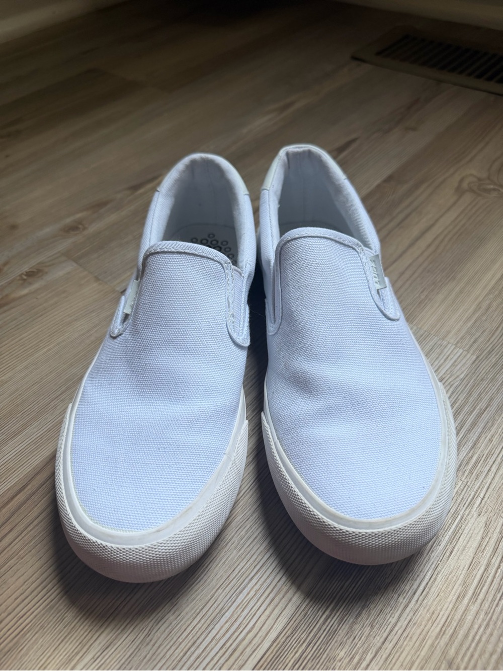 Lugz Clipper slip-on sneakers in white canvas.